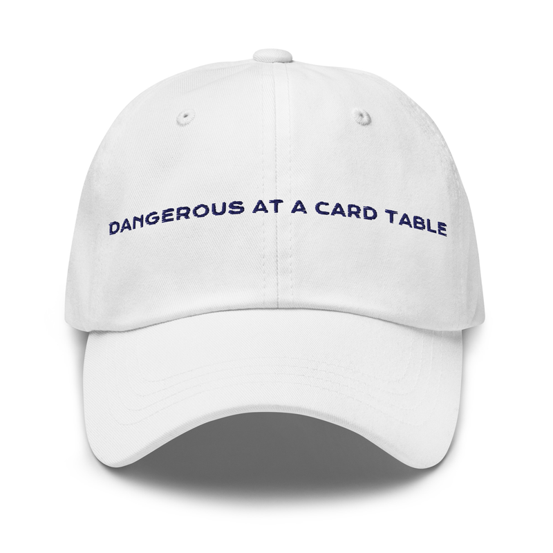 Dangerous at a Card Table Cap in white with navy embroidery