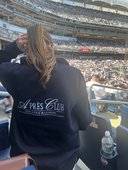 Navy Après Club crest fleece pullover, styled photo