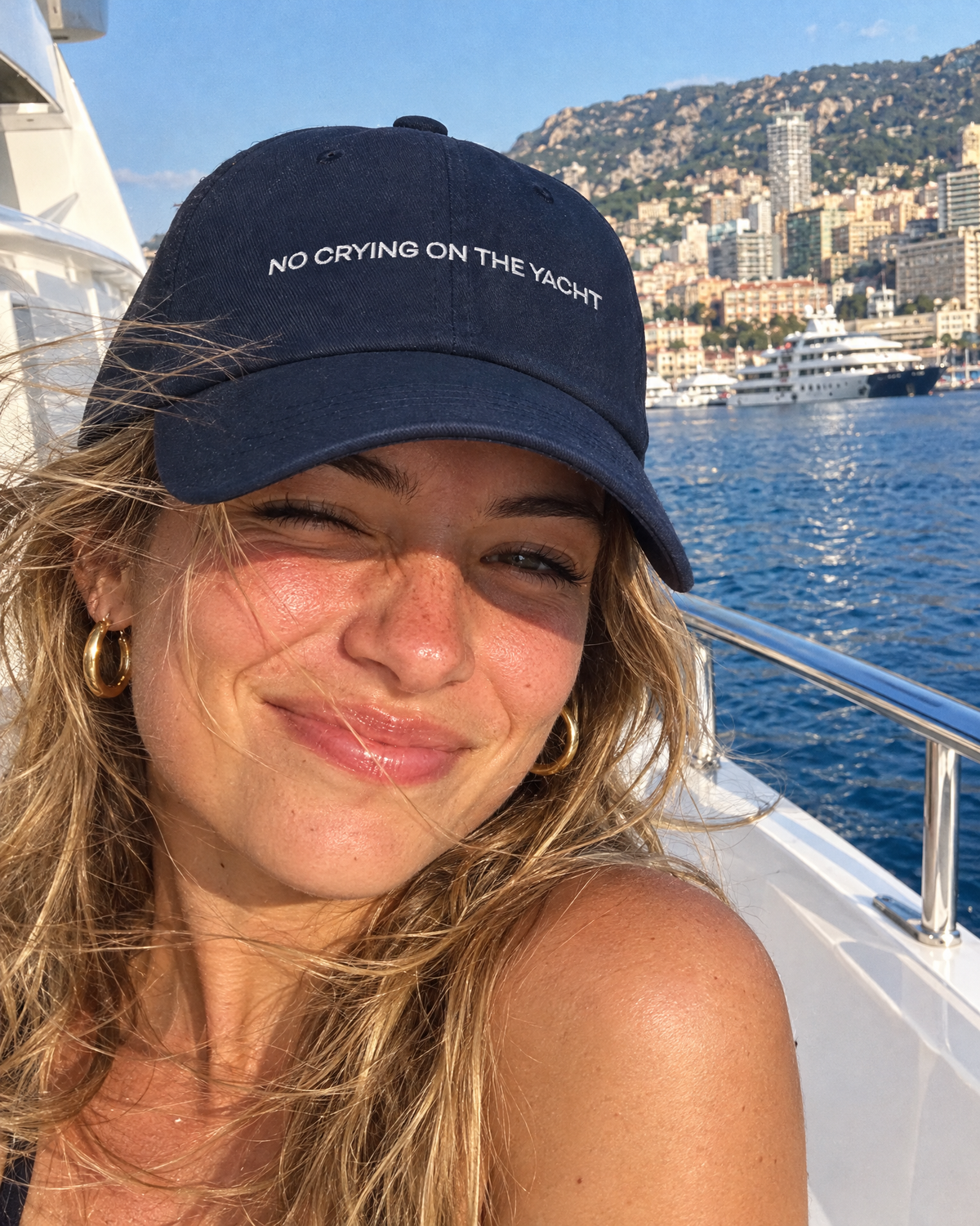 No Crying On The Yacht navy embroidered cap, styled photo