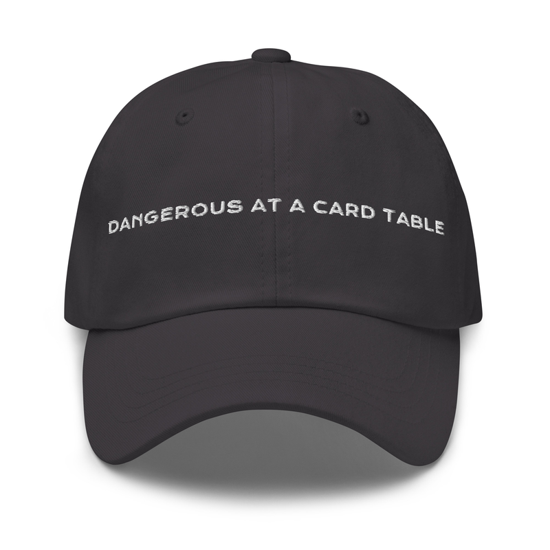 Dangerous at a Card Table Cap in dark grey with white embroidery